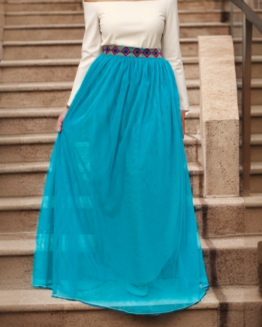 turquoise  tulle skirt women  tulle skirt long  tulle skirt  tulle  stylish  spring  special occasion.  special  sparkle  skirt  maxi skirt  long tulle skirt  hijab  feminine  fashion  evining wear  emproidery  embroidery  elegant night  elegant  Boston Blue Muzdana Skirt  A line skirt  A line midi skirt  palestinian  palestinian women  threads identity palestinian embroidery  arab women
